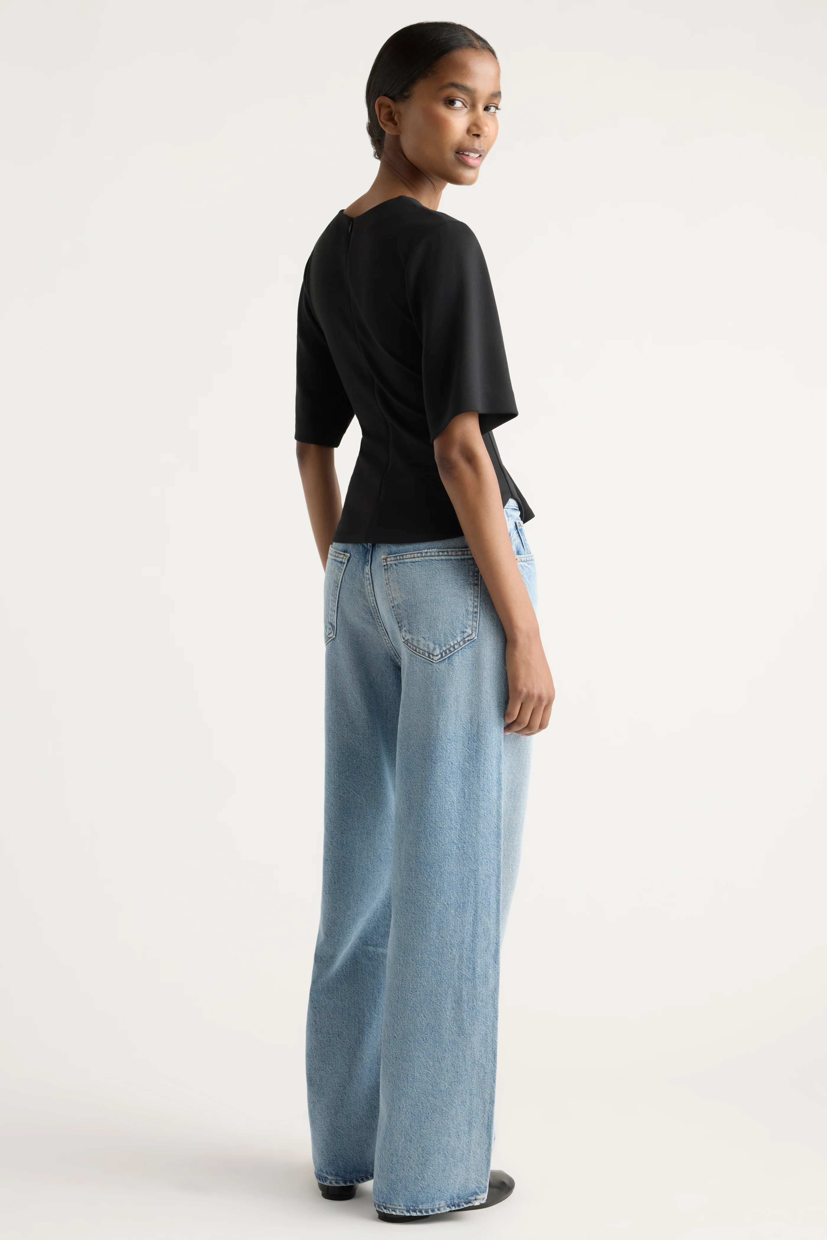 Reem Sculpted Curved-Hem Tee - Image 8